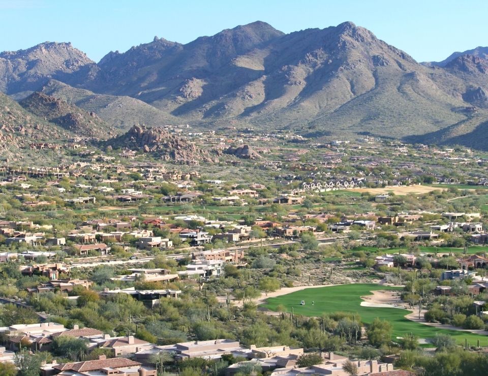 Enjoying the lush greenery of Central Scottsdale’s community golf course, a highlight of local lifestyle amenities.