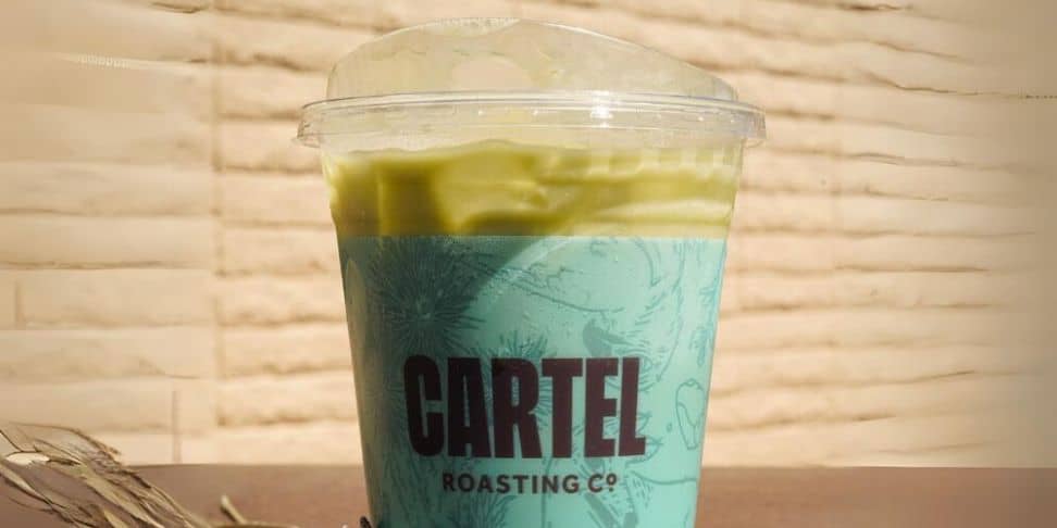 A glimpse into Cartel Roasting Co.'s unique offerings, celebrated for their matcha latte among other specialty drinks.